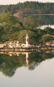 Preview wallpaper lighthouse, island, trees, reflection, lake