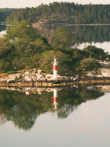 Preview wallpaper lighthouse, island, trees, reflection, lake