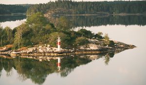 Preview wallpaper lighthouse, island, trees, reflection, lake