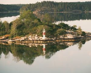 Preview wallpaper lighthouse, island, trees, reflection, lake