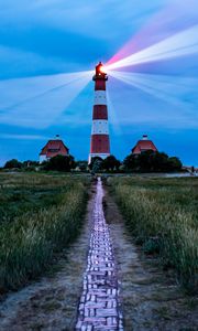 Preview wallpaper lighthouse, light, houses, road, field, grass