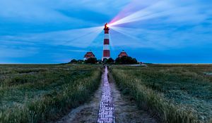Preview wallpaper lighthouse, light, houses, road, field, grass
