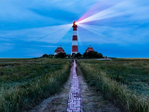 Preview wallpaper lighthouse, light, houses, road, field, grass
