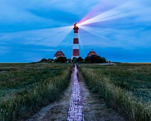 Preview wallpaper lighthouse, light, houses, road, field, grass