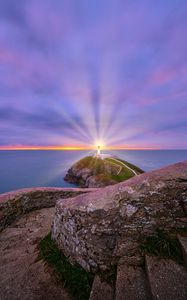 Preview wallpaper lighthouse, light, sea, stones