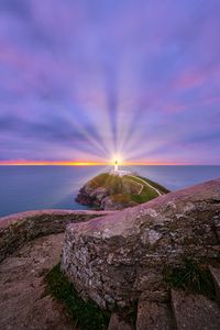 Preview wallpaper lighthouse, light, sea, stones
