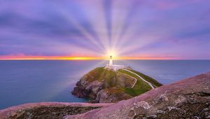 Preview wallpaper lighthouse, light, sea, stones