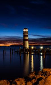 Preview wallpaper lighthouse, night, coast, reflection