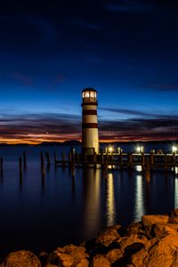 Preview wallpaper lighthouse, night, coast, reflection