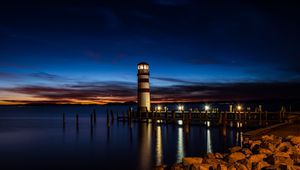 Preview wallpaper lighthouse, night, coast, reflection