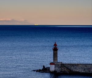 Preview wallpaper lighthouse, ocean, water, waves, twilight
