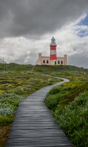 Preview wallpaper lighthouse, path, greenery, clouds