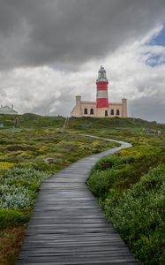 Preview wallpaper lighthouse, path, greenery, clouds