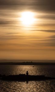 Preview wallpaper lighthouse, pier, island, sea, evening