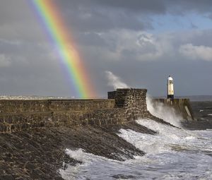 Preview wallpaper lighthouse, rainbow, sea, waves