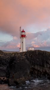 Preview wallpaper lighthouse, rock, cliff, sea
