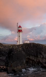 Preview wallpaper lighthouse, rock, cliff, sea
