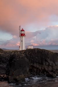 Preview wallpaper lighthouse, rock, cliff, sea