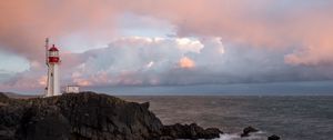Preview wallpaper lighthouse, rock, cliff, sea