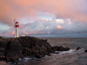 Preview wallpaper lighthouse, rock, cliff, sea