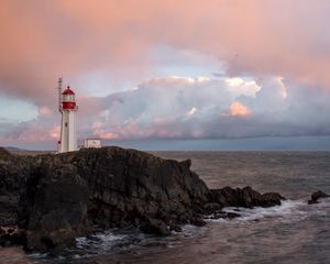 Preview wallpaper lighthouse, rock, cliff, sea