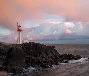 Preview wallpaper lighthouse, rock, cliff, sea