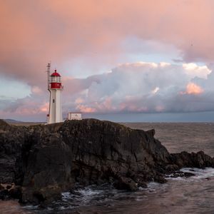 Preview wallpaper lighthouse, rock, cliff, sea