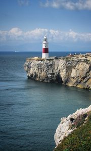Preview wallpaper lighthouse, rock, cliff, sea, landscape