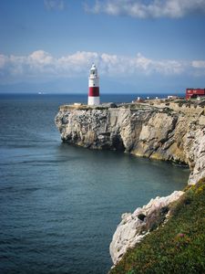 Preview wallpaper lighthouse, rock, cliff, sea, landscape