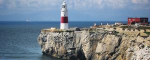 Preview wallpaper lighthouse, rock, cliff, sea, landscape