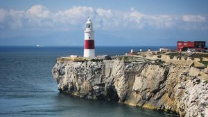 Preview wallpaper lighthouse, rock, cliff, sea, landscape