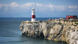 Preview wallpaper lighthouse, rock, cliff, sea, landscape