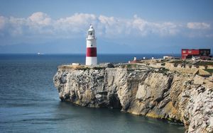 Preview wallpaper lighthouse, rock, cliff, sea, landscape