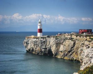 Preview wallpaper lighthouse, rock, cliff, sea, landscape