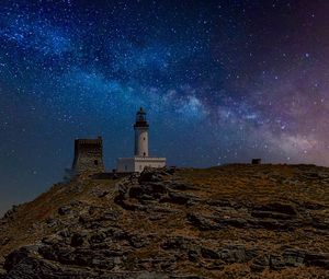 Preview wallpaper lighthouse, rock, sea, night, milky way