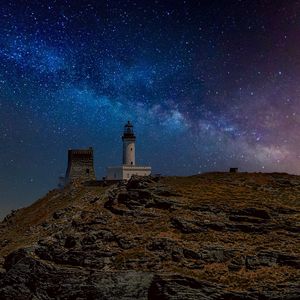 Preview wallpaper lighthouse, rock, sea, night, milky way