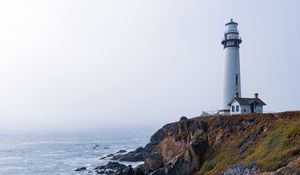 Preview wallpaper lighthouse, rock, slope, relief