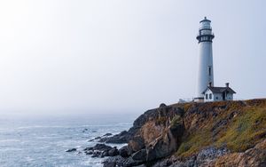 Preview wallpaper lighthouse, rock, slope, relief