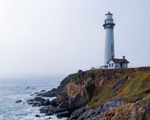 Preview wallpaper lighthouse, rock, slope, relief