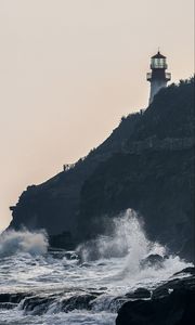 Preview wallpaper lighthouse, rock, waves, sea, shore