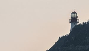 Preview wallpaper lighthouse, rock, waves, sea, shore