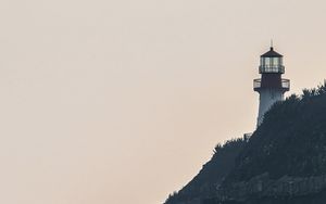 Preview wallpaper lighthouse, rock, waves, sea, shore
