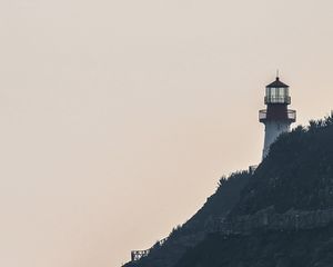 Preview wallpaper lighthouse, rock, waves, sea, shore