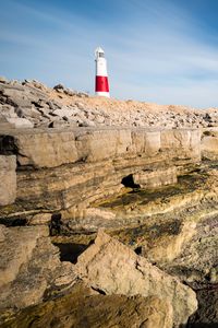 Preview wallpaper lighthouse, rocks, relief, stones, nature
