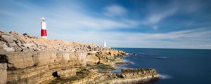 Preview wallpaper lighthouse, rocks, relief, stones, nature