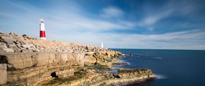 Preview wallpaper lighthouse, rocks, relief, stones, nature