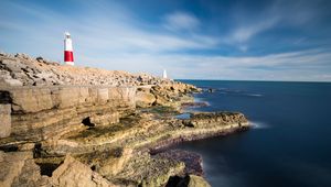 Preview wallpaper lighthouse, rocks, relief, stones, nature