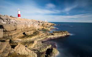 Preview wallpaper lighthouse, rocks, relief, stones, nature