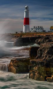 Preview wallpaper lighthouse, rocks, sea, spray, water