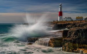 Preview wallpaper lighthouse, rocks, sea, spray, water